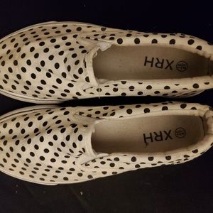 White and black polka dot shoes